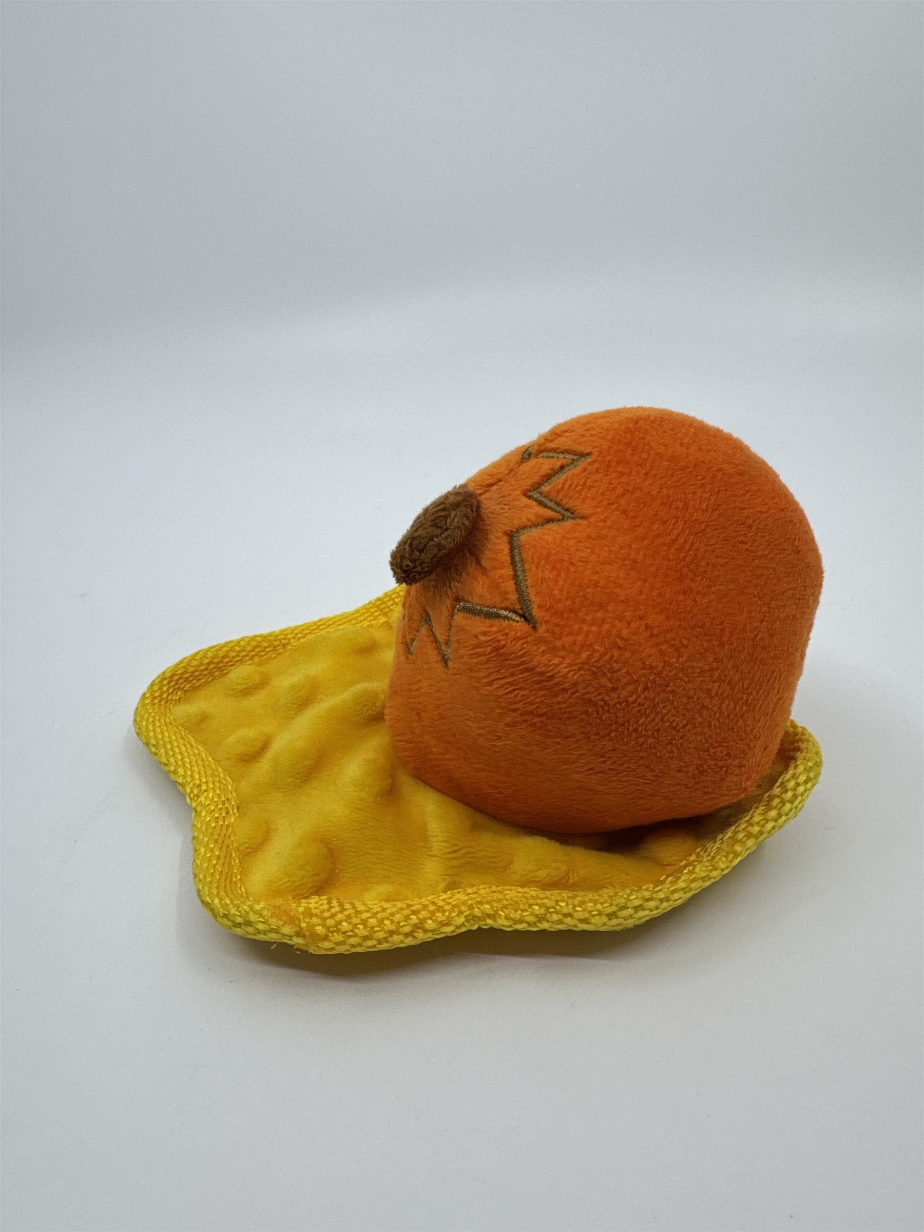 Smashed Pumpkin Halloween Bark Squeaker Dog Toy