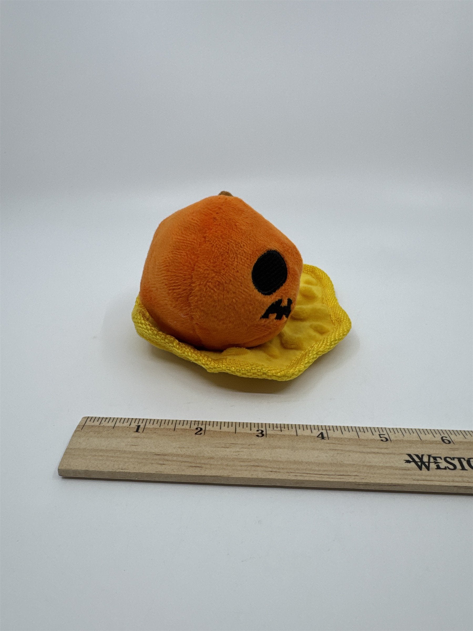 Smashed Pumpkin Halloween Bark Squeaker Dog Toy