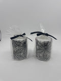 Set of Two White And Black Halloween Spider Web Candles In Plastic