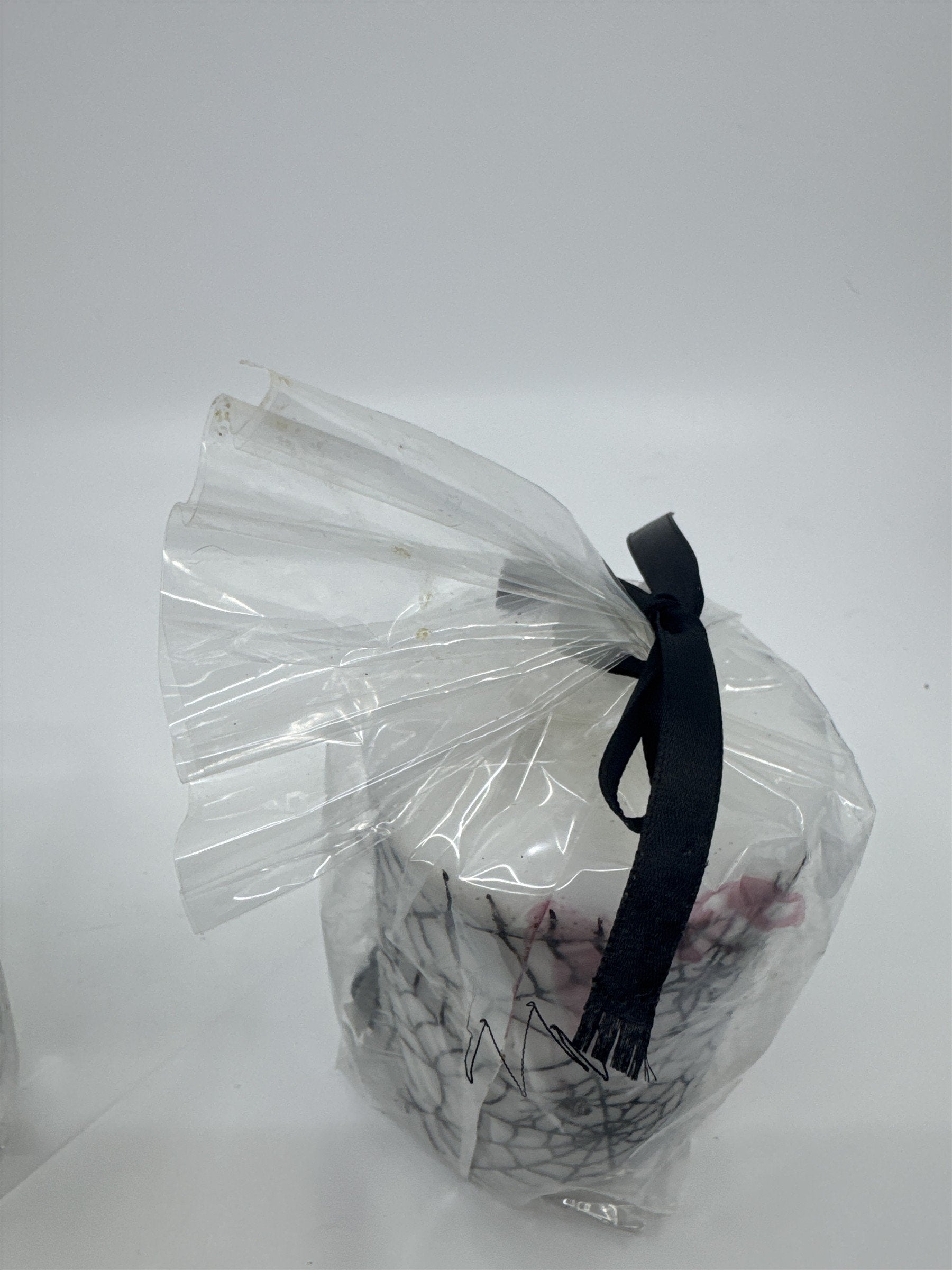 Set of Two White And Black Halloween Spider Web Candles In Plastic