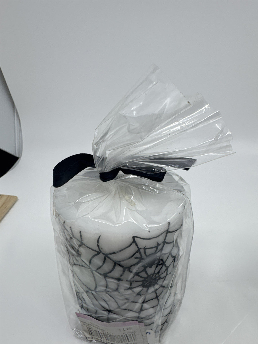 Set of Two White And Black Halloween Spider Web Candles In Plastic