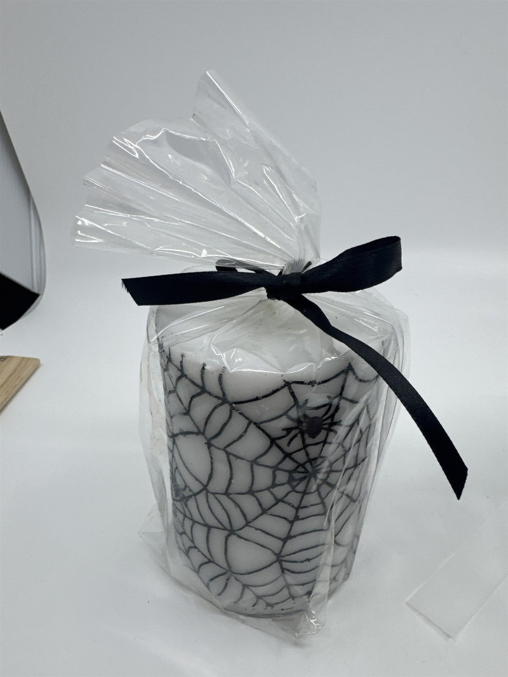 Set of Two White And Black Halloween Spider Web Candles In Plastic