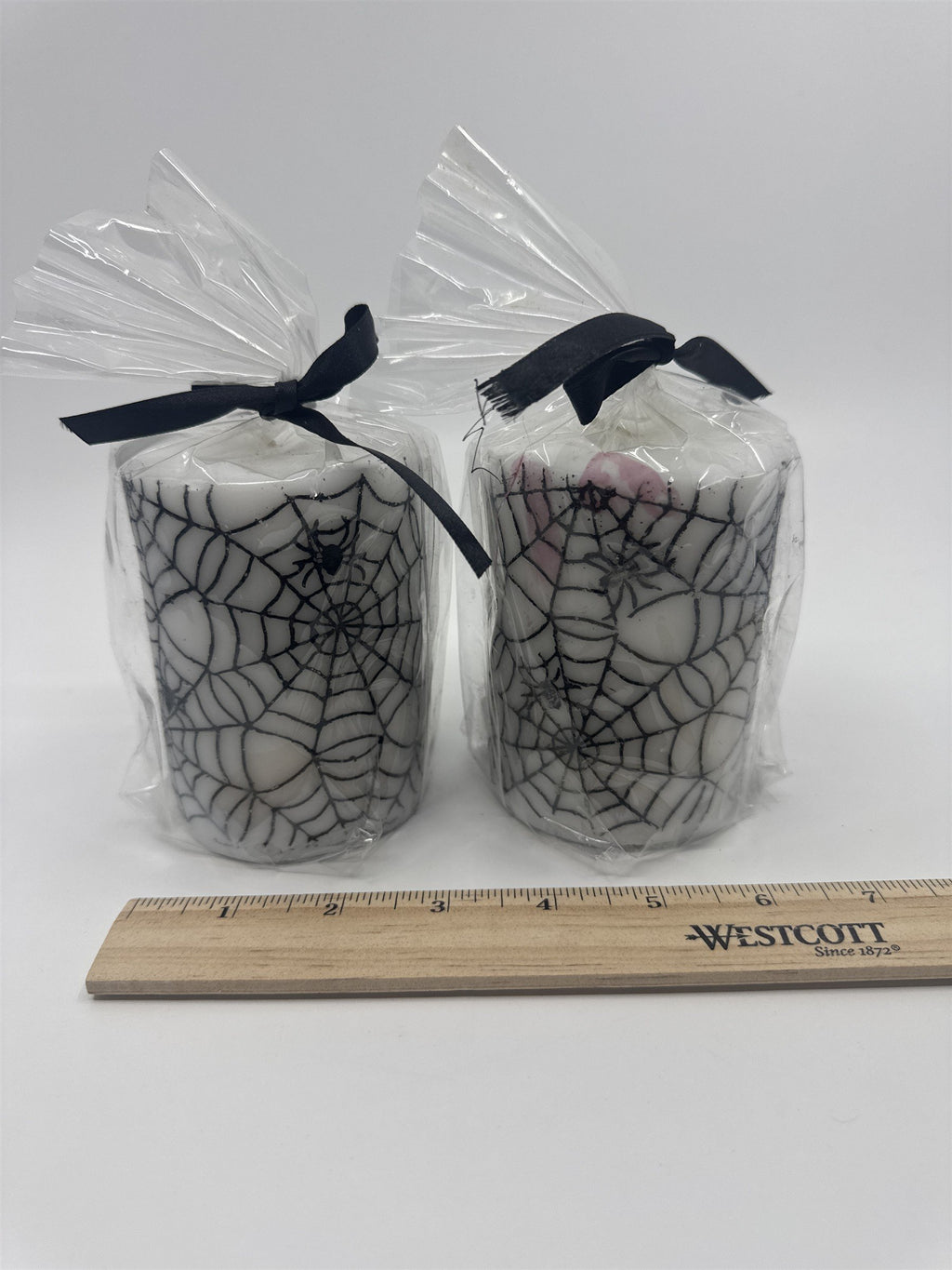 Set of Two White And Black Halloween Spider Web Candles In Plastic