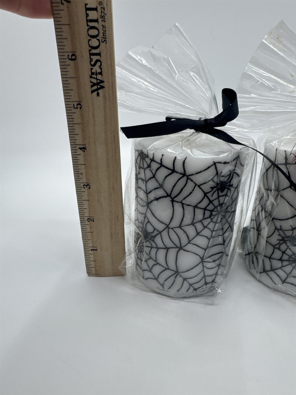 Set of Two White And Black Halloween Spider Web Candles In Plastic