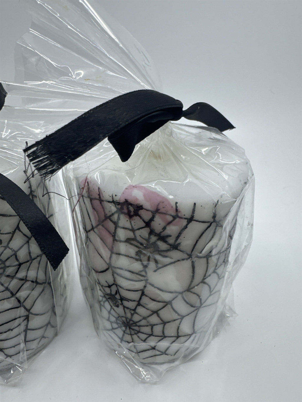 Set of Two White And Black Halloween Spider Web Candles In Plastic