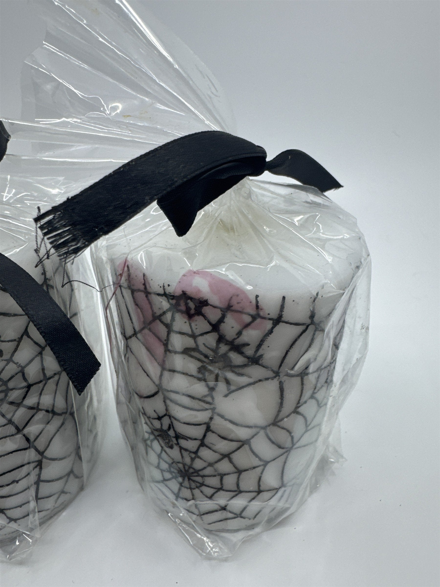 Set of Two White And Black Halloween Spider Web Candles In Plastic