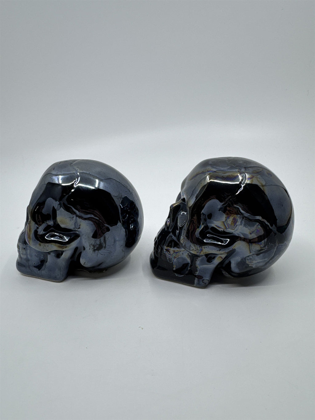 Set of Two Blue Shiny Ceramic Halloween Decor Skulls