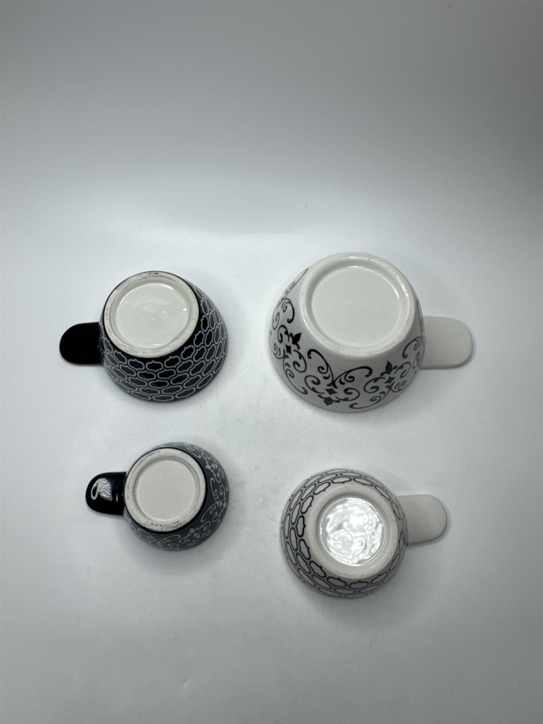 Set of 4 Ceramic Ornate Pattern Meashing Cups 1/4c-1c (Some Crazing)
