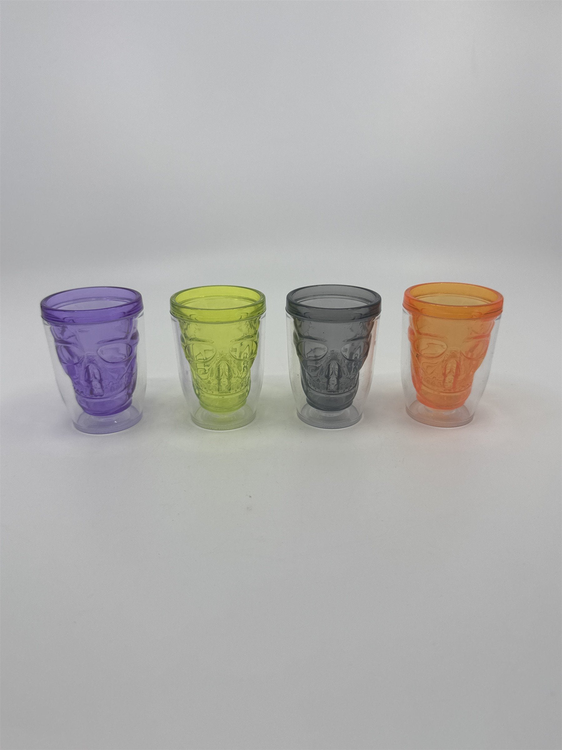 Set of Four Multicolored Skull Halloween Plastic Microwavable Shotglasses
