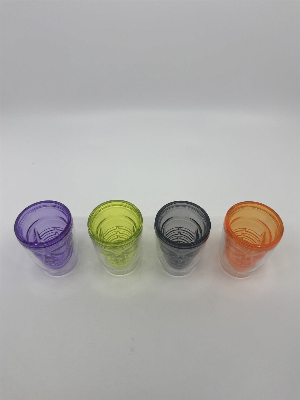 Set of Four Multicolored Skull Halloween Plastic Microwavable Shotglasses