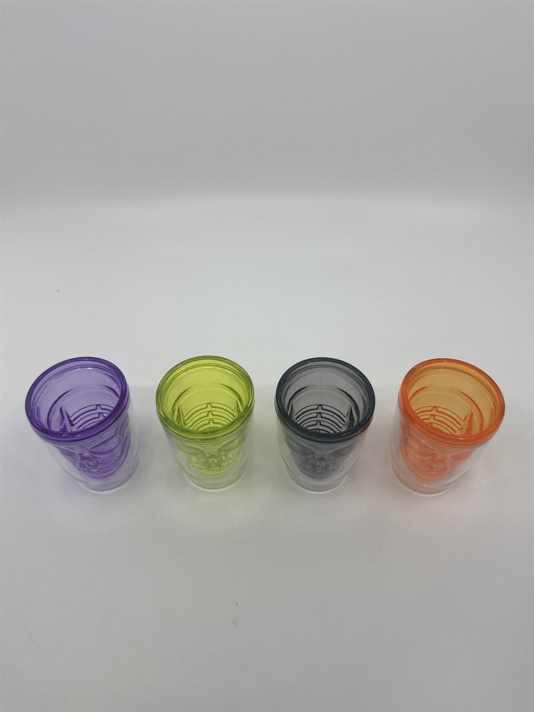 Set of Four Multicolored Skull Halloween Plastic Microwavable Shotglasses