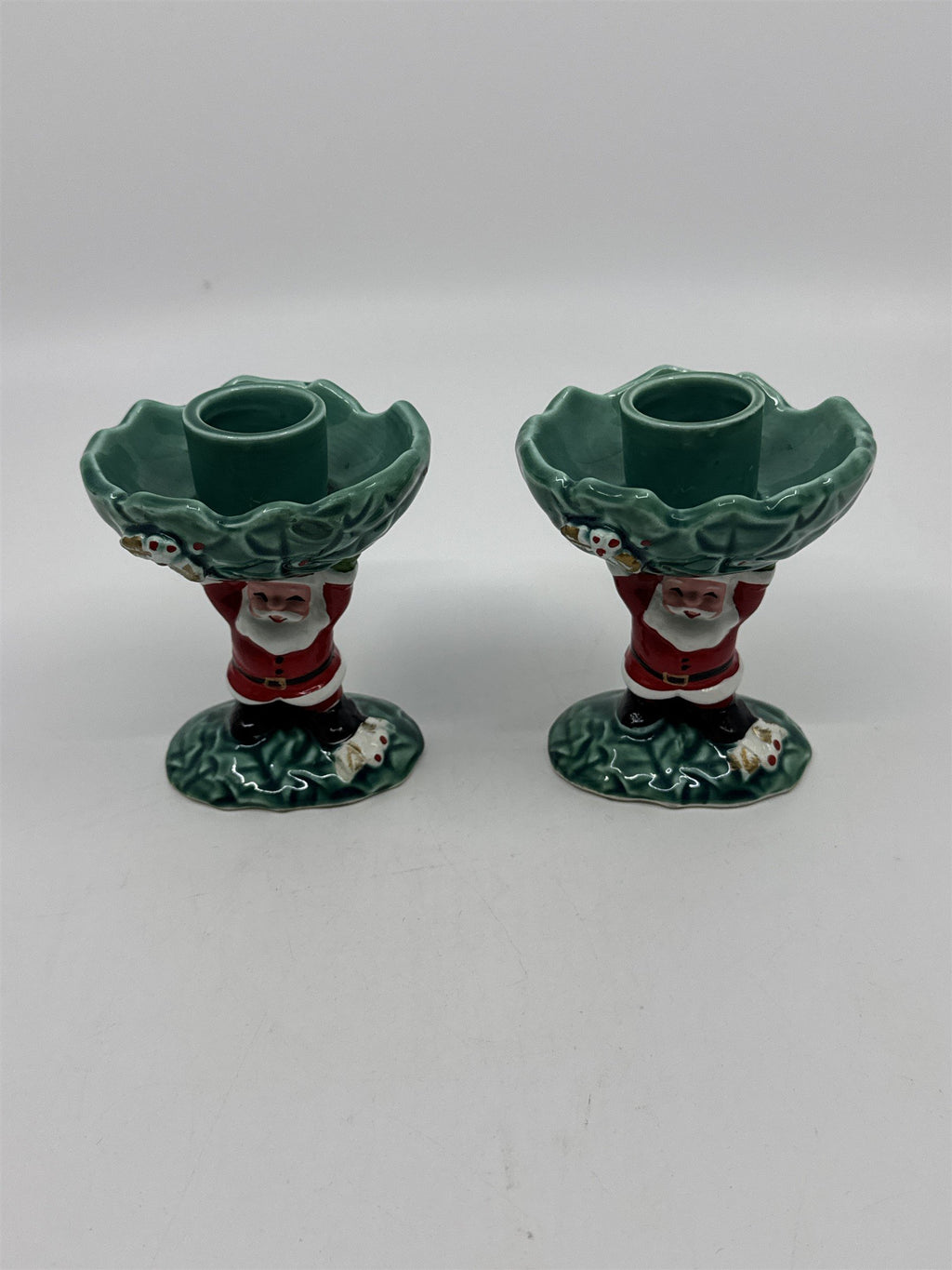 Set Of Two Vintage 1962 Christmas Santa Clause Holding Holly Candle Holders