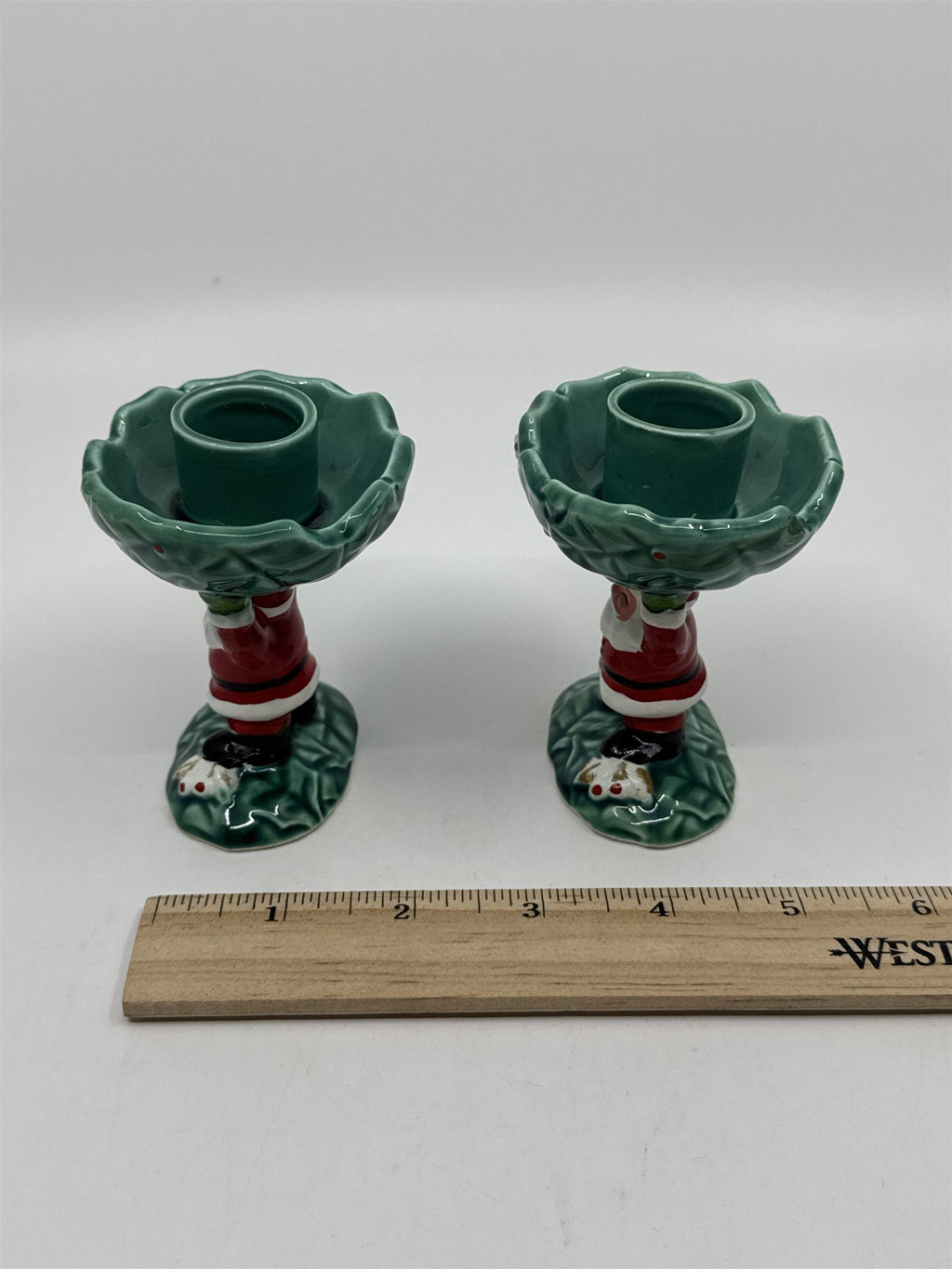 Set Of Two Vintage 1962 Christmas Santa Clause Holding Holly Candle Holders