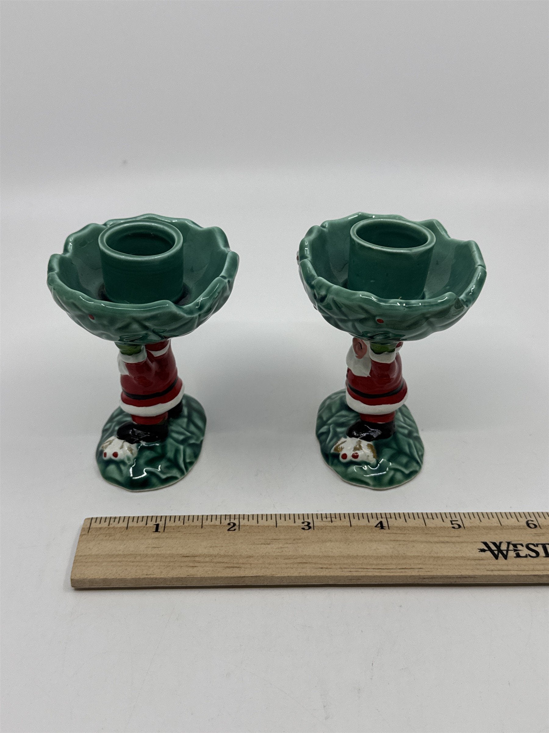 Set Of Two Vintage 1962 Christmas Santa Clause Holding Holly Candle Holders