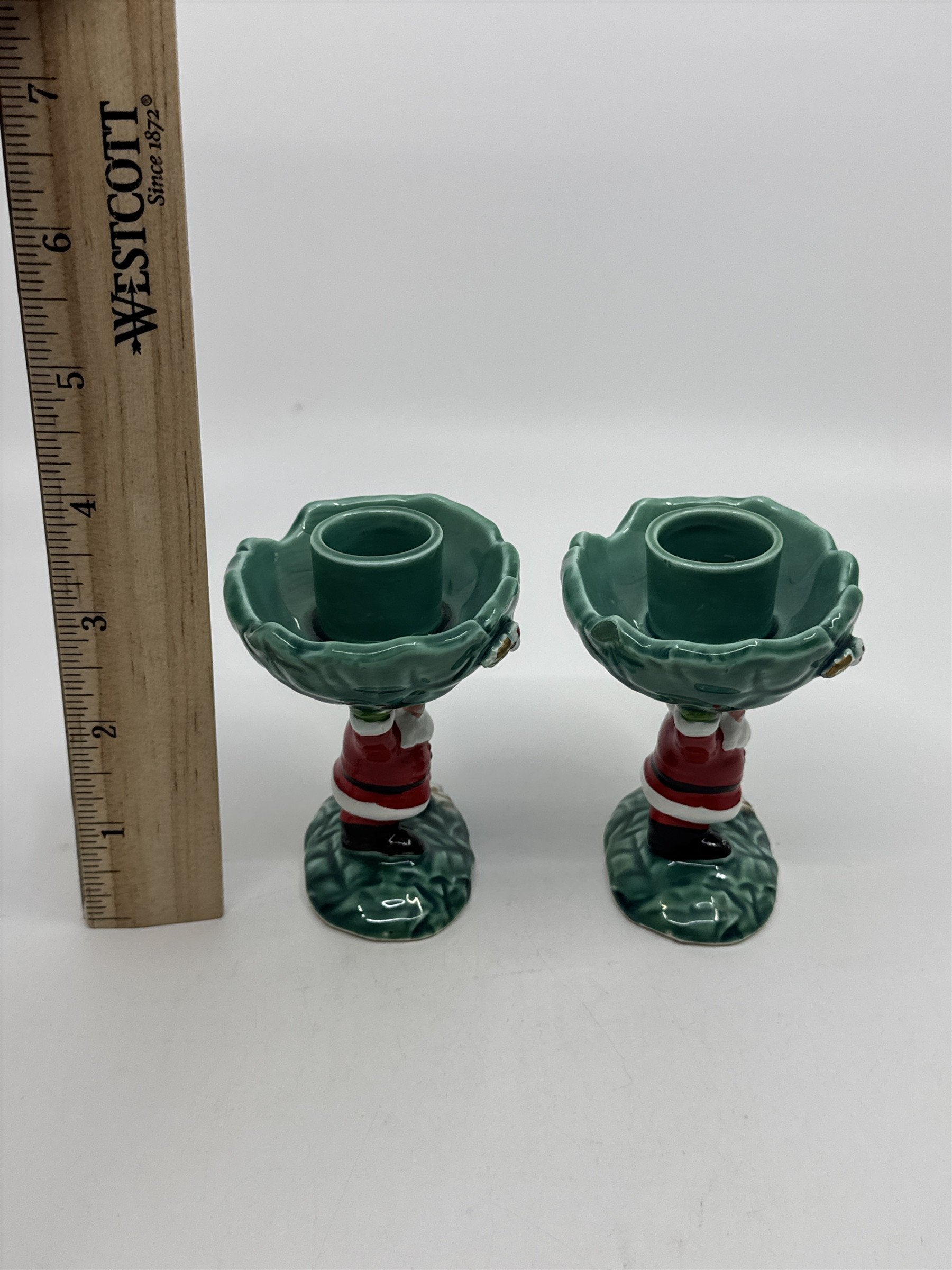 Set Of Two Vintage 1962 Christmas Santa Clause Holding Holly Candle Holders