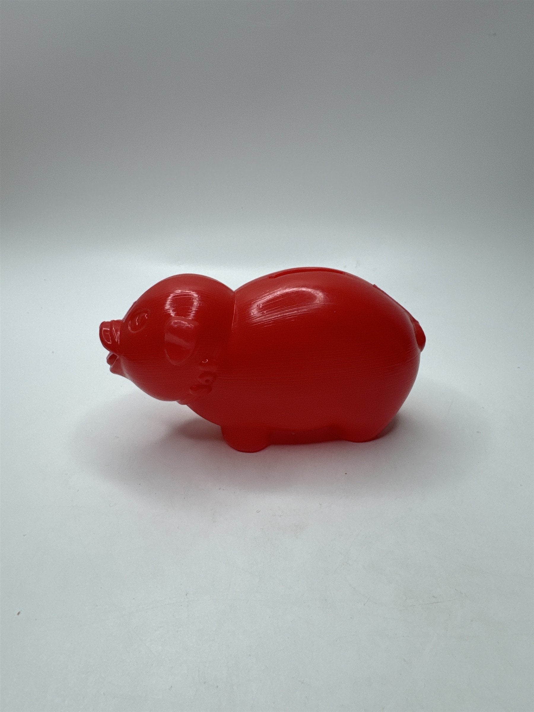Vintage Red Blow Mold Plastic Piggy Bank Small