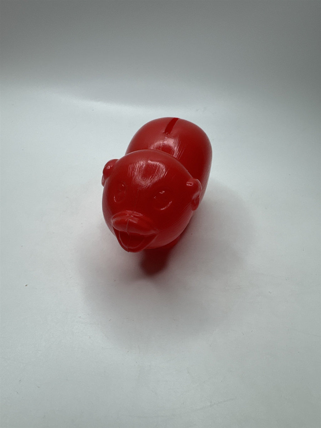 Vintage Red Blow Mold Plastic Piggy Bank Small
