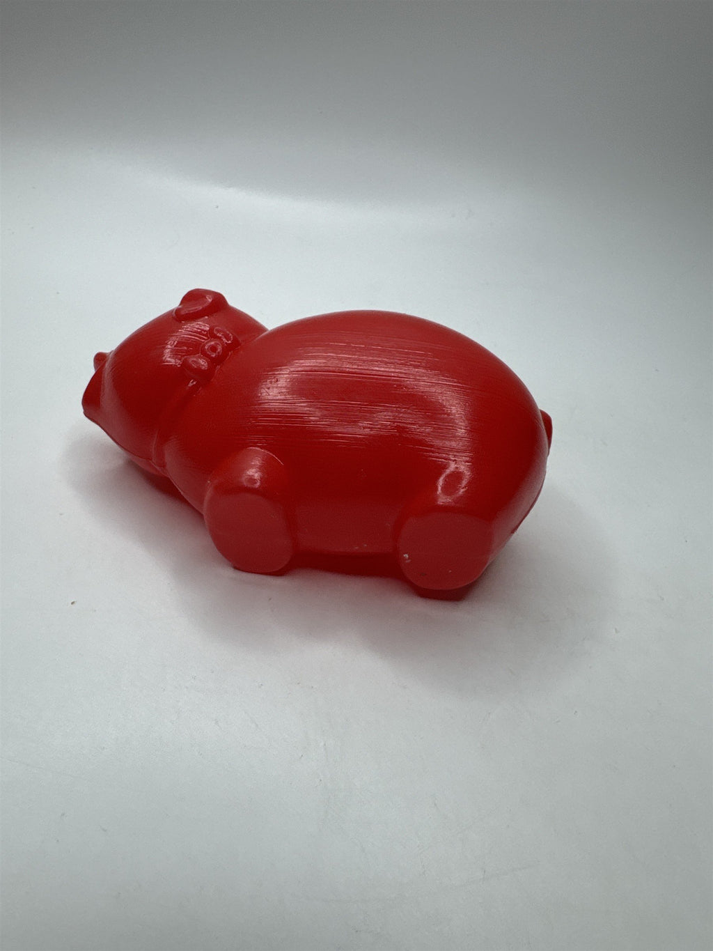 Vintage Red Blow Mold Plastic Piggy Bank Small