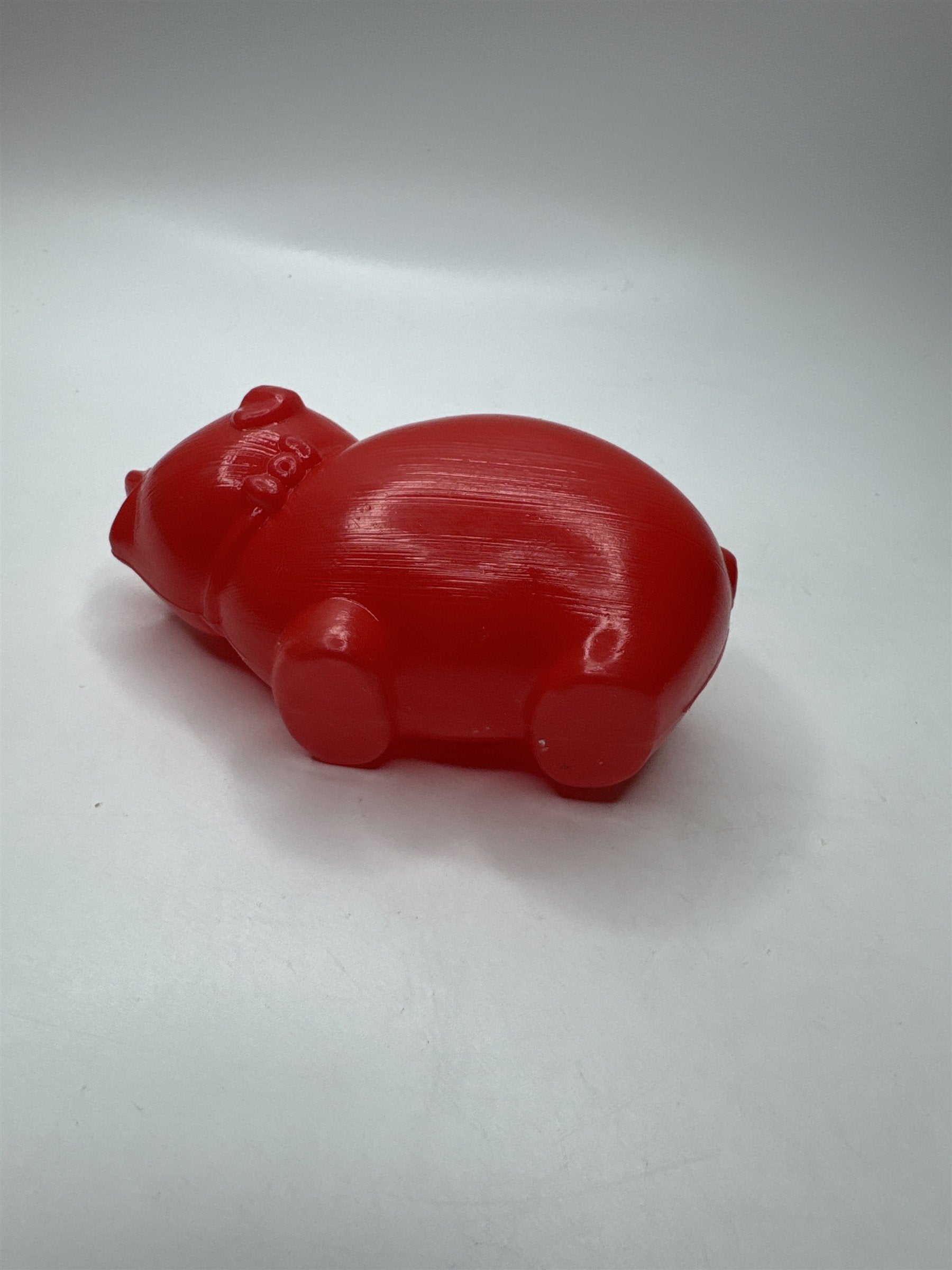 Vintage Red Blow Mold Plastic Piggy Bank Small