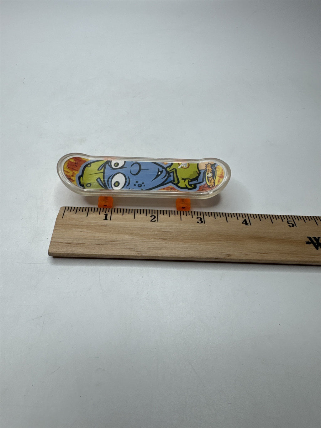 Vintage Finger Board Toy Mini Skateboard Clear Trucks Orange Wheels Cartoon Head