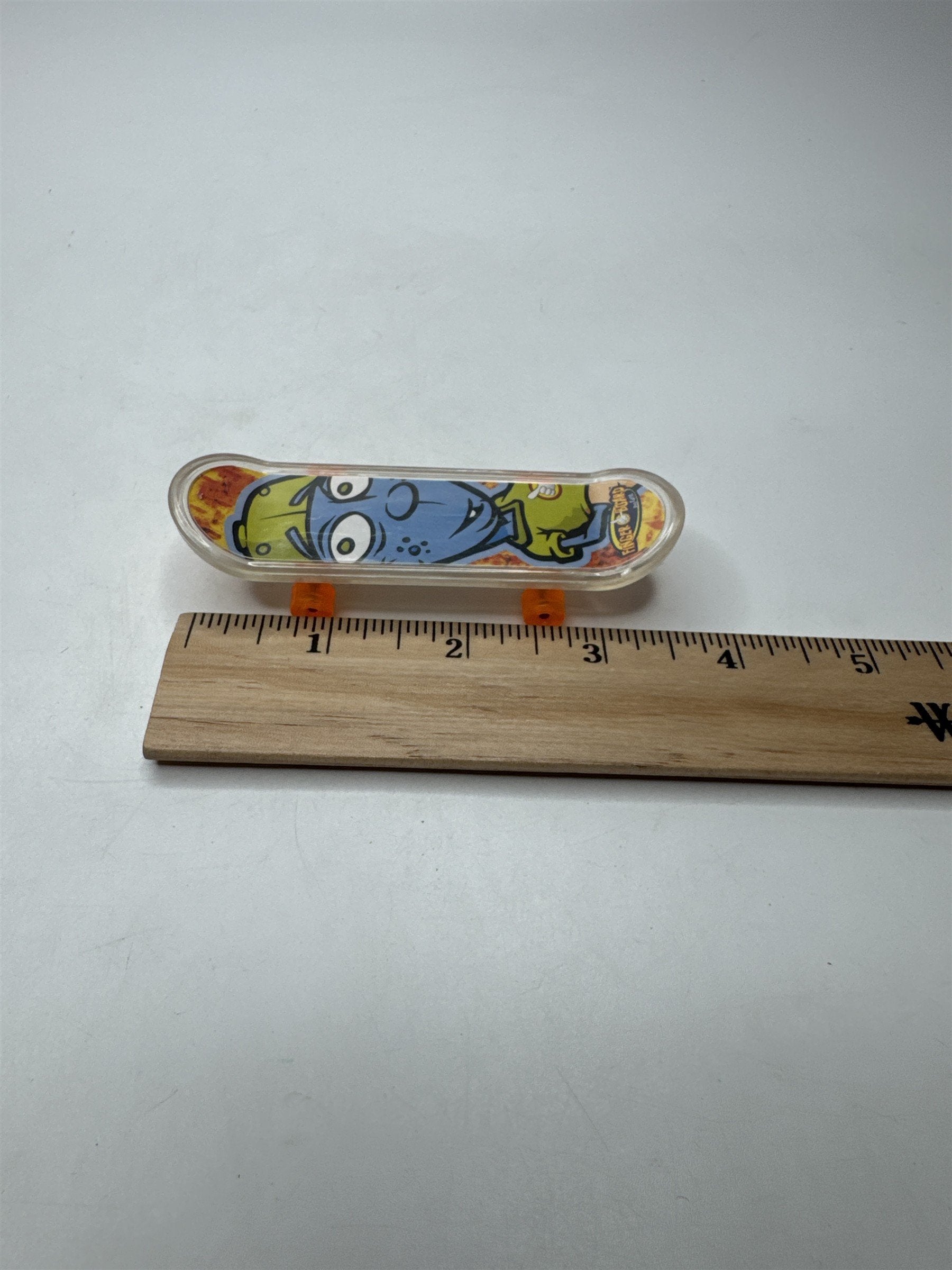 Vintage Finger Board Toy Mini Skateboard Clear Trucks Orange Wheels Cartoon Head