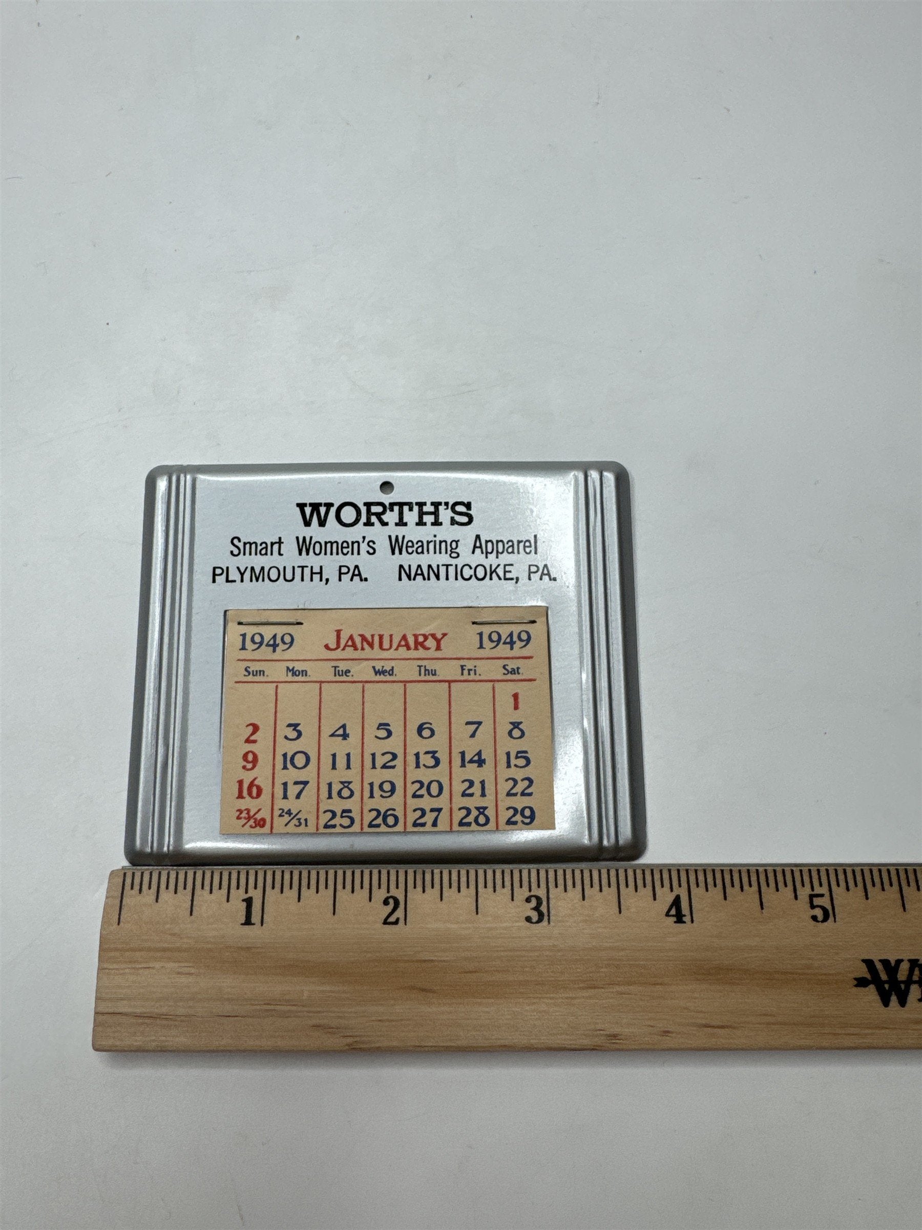 Vintage 1949 Worth's Smart Women's Apparel Nanticoke Plymouth PA Metal Calendar