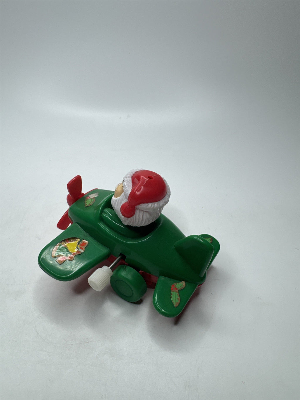 VTG Wind-Up Santa Claus Green Airplane Toy Hard Plastic Christmas Collectible