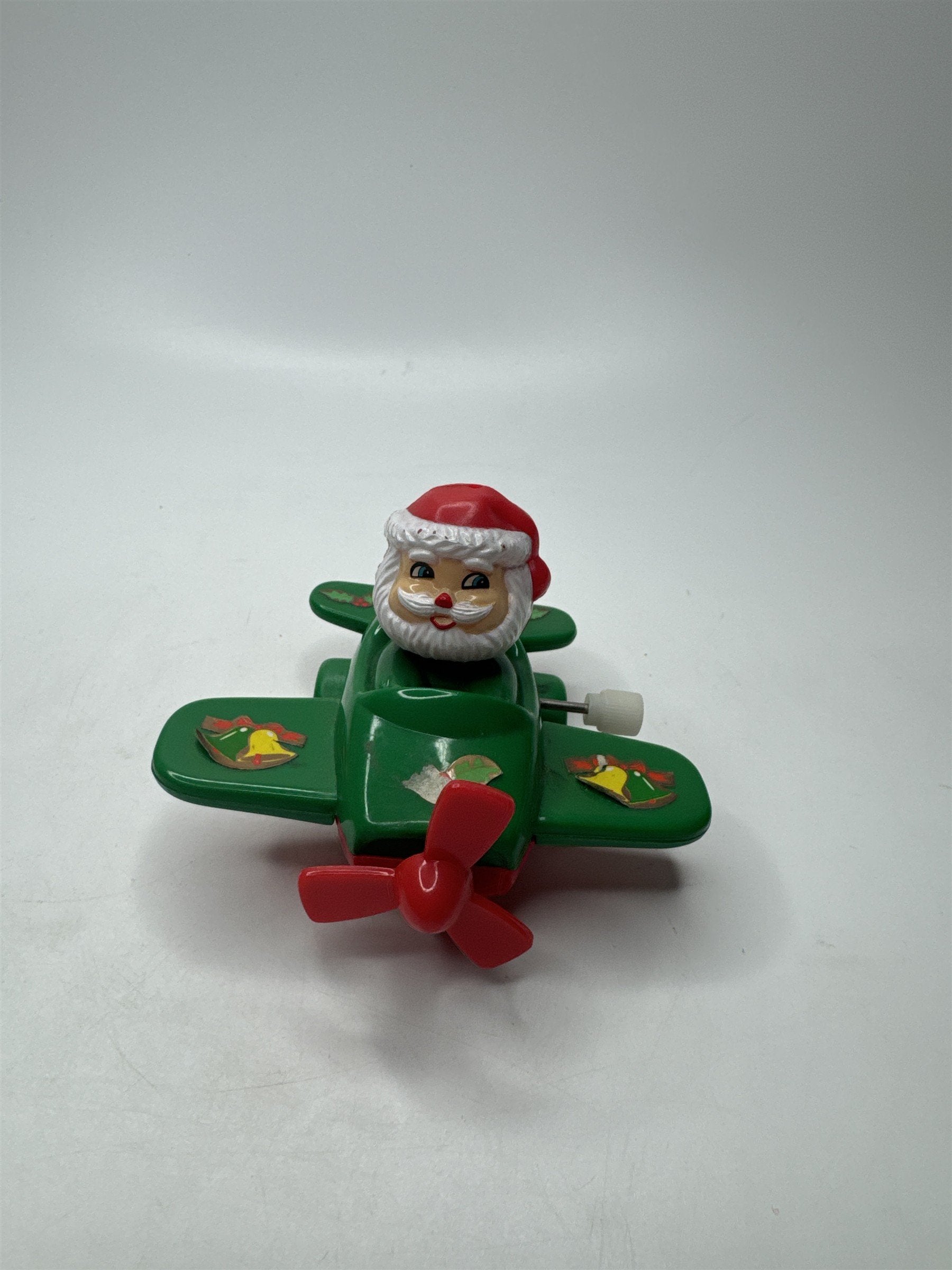 VTG Wind-Up Santa Claus Green Airplane Toy Hard Plastic Christmas Collectible