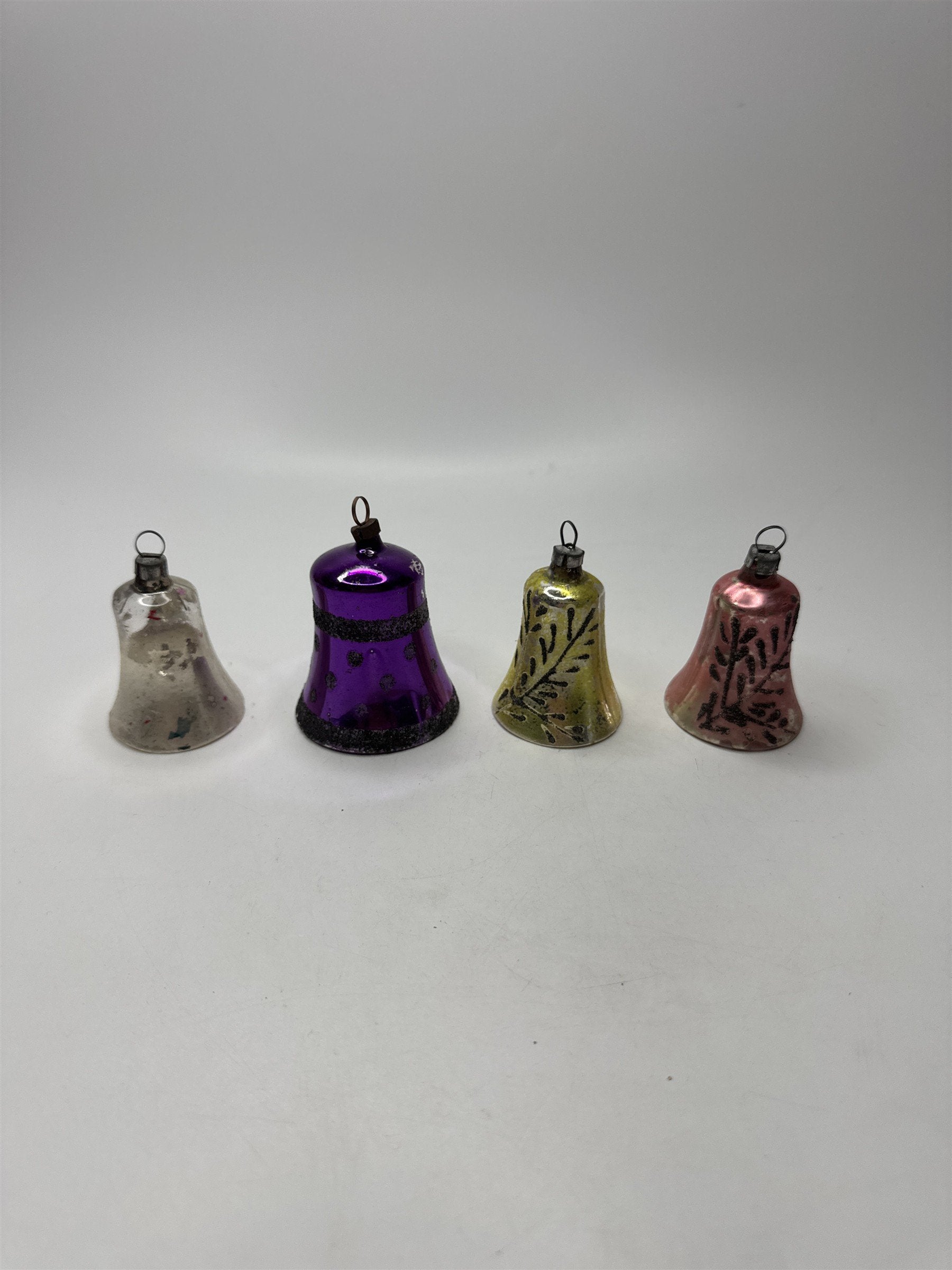 Set 4 Vintage Plastic Bell Ornaments Assorted Purple Scrollwork Glitter