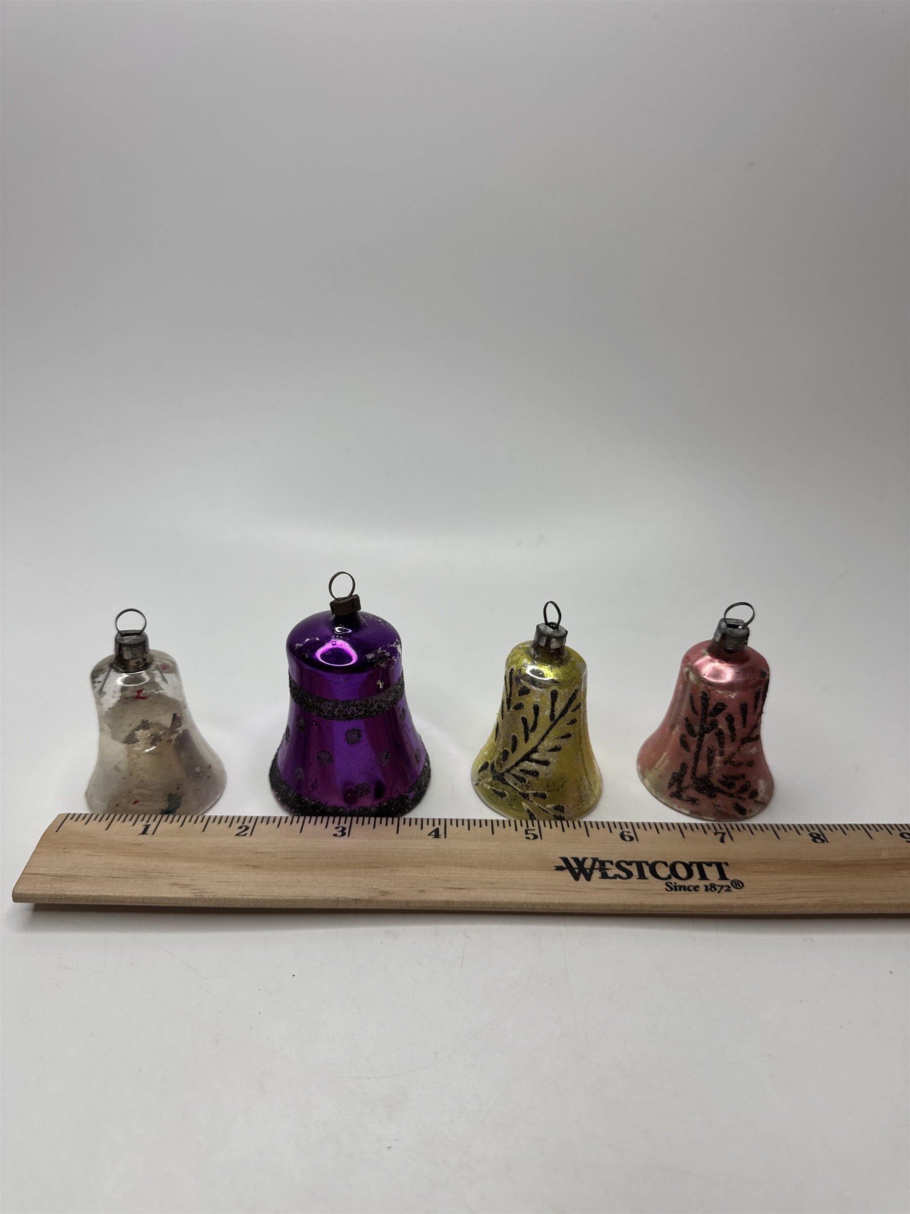 Set 4 Vintage Plastic Bell Ornaments Assorted Purple Scrollwork Glitter