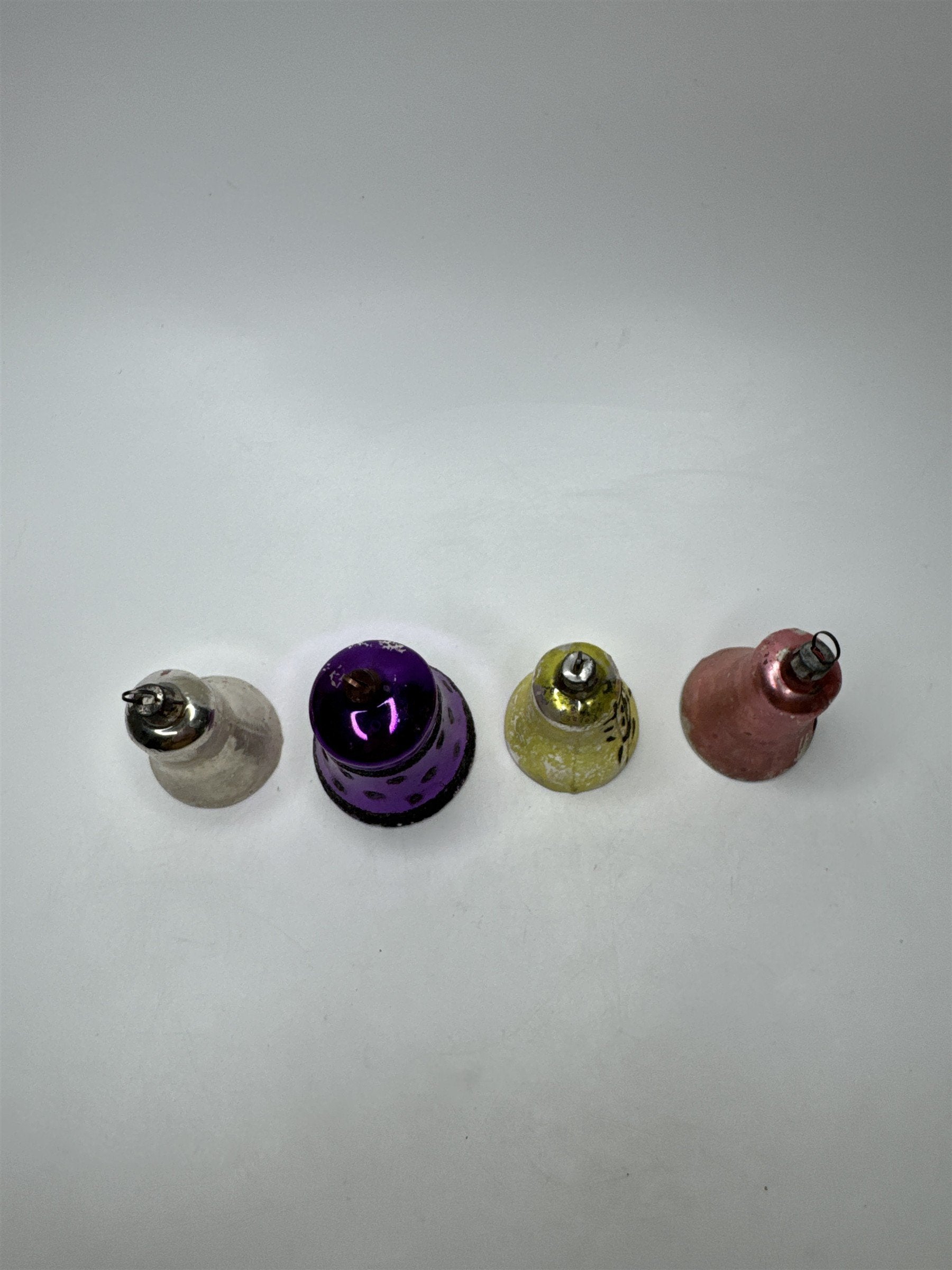 Set 4 Vintage Plastic Bell Ornaments Assorted Purple Scrollwork Glitter