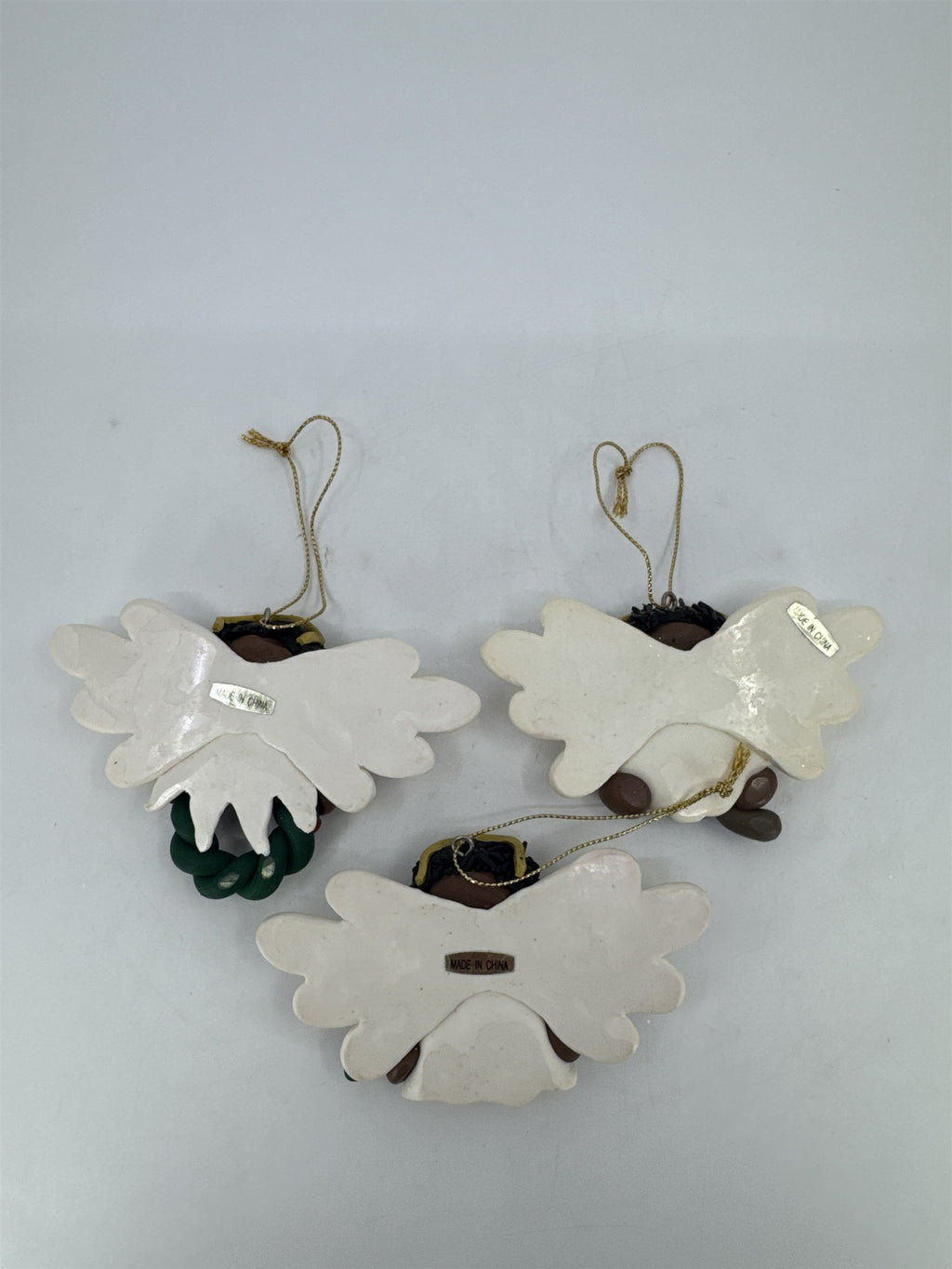 Set Of Three Black Singing Angel Clay Christmas Ornaments