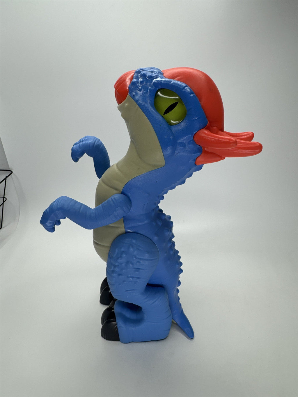 Stylized Blue Dinosaur Figure Toy Red Head Green Eye PVC Imaginext Style