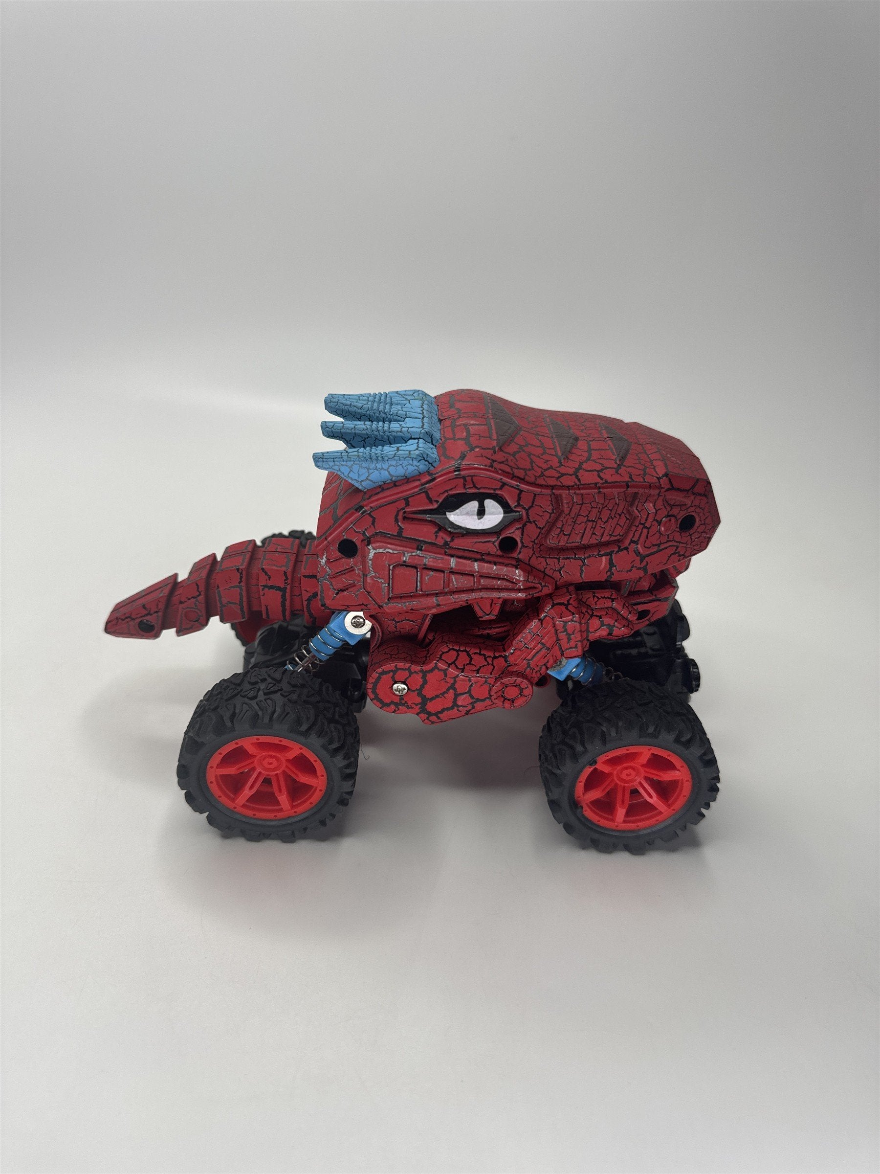 Aeromax Rugged Racers Dino-Faur Pull Back Truck Red 4x4 Monster Toy
