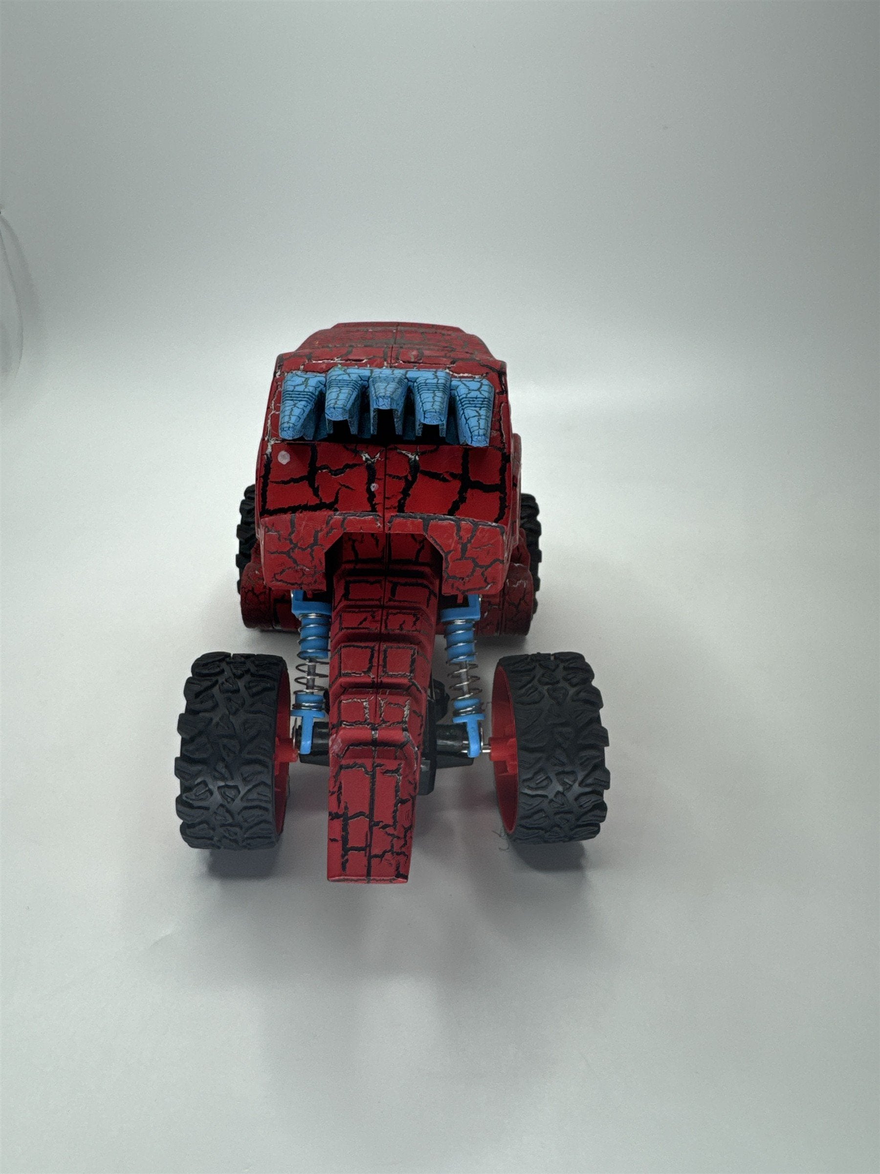 Aeromax Rugged Racers Dino-Faur Pull Back Truck Red 4x4 Monster Toy