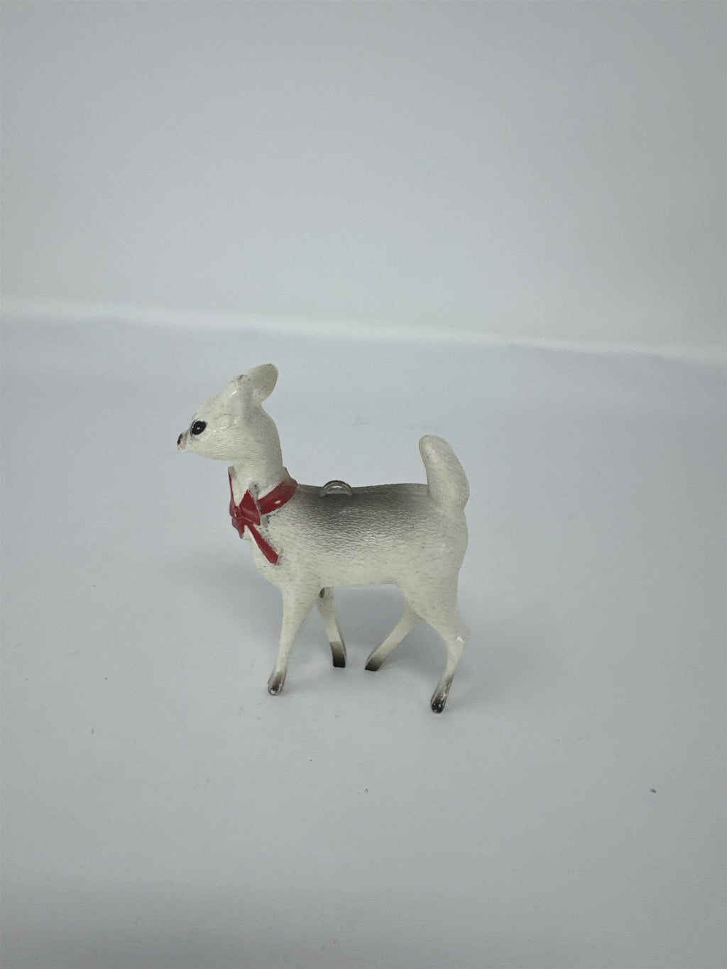 Vintage Christmas Reindeer Ornament Hard Plastic White Grey Red Bow Kitsch