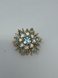 Vintage Snowflake Brooch Blue White Rhinestone Sunburst Pin Gold Tone