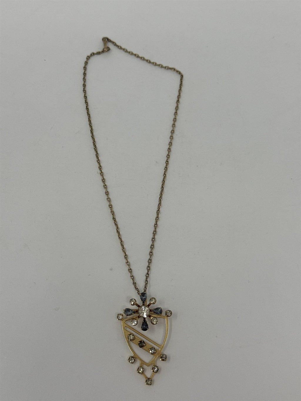 Gold Tone Light Blue Rhinestone Snowflake Starburst Crest Pin Pendant Necklace