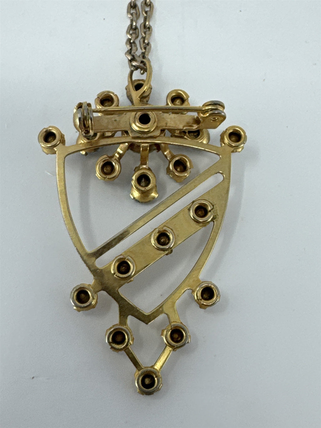 Gold Tone Light Blue Rhinestone Snowflake Starburst Crest Pin Pendant Necklace